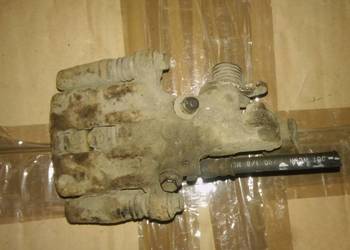 Nissan Almera N16 Tino zacisk lewy tył