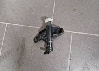 Spryskiwacz lewy Kia Optima IV 98673-D4000