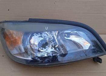 ZAFIRA A LAMPA PRZÓD PRAWA SOCZEWKA XENON EU