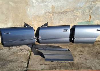 Subaru Legacy 3 BH5 drzwi przód tył lewe prawe 86F zamek mec