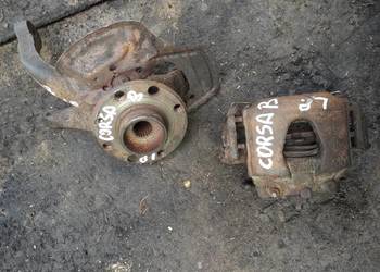 OPEL CORSA B zacisk jarzmo przód lewe