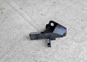 MERCEDES W205 WSPORNIK PASA LAMPY LEWY PRZÓD A2056203401