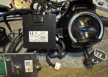 TOYOTA CHR,COROLLA  konsola, podłokietnik, halogen L,i, lampa R, PDC