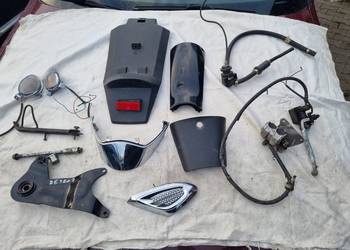 Romet Retro 7 Koło Felga Opona Zacisk Ośka Podnóżka Kierunkowskaz Chrom moc