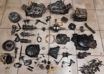 Kawasaki KMX 125 silnik części cylinder wał magneto kapa MXI