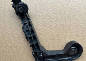 TOYOTA COROLLA E21 ŚLIZG ZDERZAKA PRAWY PRZEDNI MOCOWOANIE 52115-02330