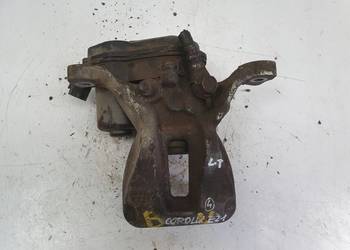Toyota Corolla XII E21 TYLNY ZACISK HAMULCOWY lewy tył KIEROWCY A006B119B
