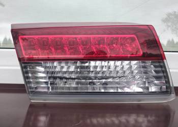 Renault Laguna 3 III liftback lampa tył tylna lewa w klapę bagażnika Europa