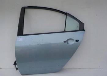 NISSAN PRIMERA P12 HB DRZWI LEWY TYŁ