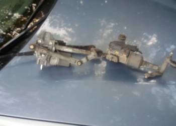 MECHANIZM PRZEDNICH WYCIERACZEK VW TOURAN 1