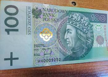 Banknot 100 zł o numerze HH0009252