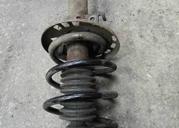 Macpherson Amortyzator przód Megane III Coupe 1,4 tce