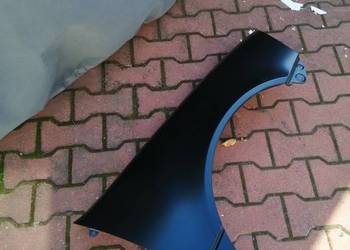 SUZUKI SWIFT do 1996  BŁOTNIK  PRZEDNI  LE/PR  NOWE