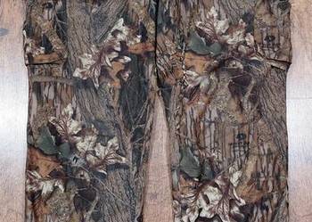 Spodnie myśliwskie Mossy Oak NORSVEDA uszkodzone