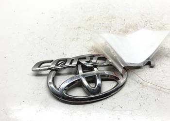 EMBLEMAT ZNACZEK KLAPY TYŁ LOGO TOYOTA COROLLA E21 Sedan/Limuzyna ZNAC