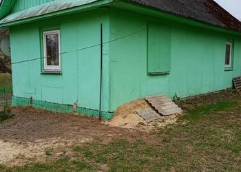 Sprzedam dom drewniany wraz z zabudowaniami gospodarczymi lasem i polem