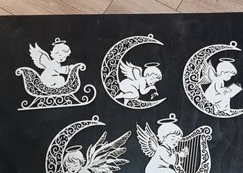 Drewniane ażurowe zawieszki