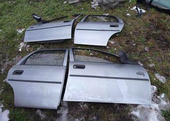 Drzwi prawe lewe przód tył Opel Combo A, Corsa B 5d. 92-00