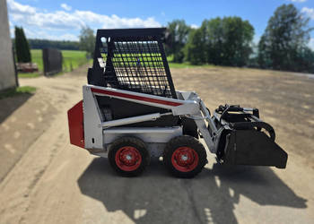 Miniładowarka BOBCAT 310, 4x4 + łyżko-krokodyl, 90 cm szerokości, waga 1 t