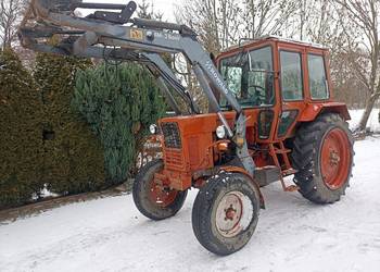 MTZ 570 + ładowacz czołowy 3 sekcyjny.