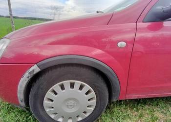 Błotnik przedni lewy Opel Corsa C