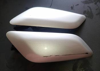 Dwie orginalne zaślepki spryskiwaczy renault laguna 3 z orginslnymi  skosam