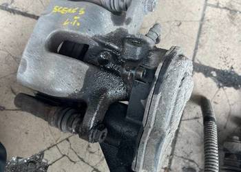 Zacisk hamulcowy lewy tył Renault Scenic III, jarzmo