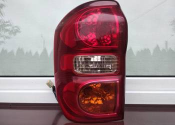 Toyota RAV4 II 2 LIFT FL lampa tył tylna lewa oprawki oryginał Europa