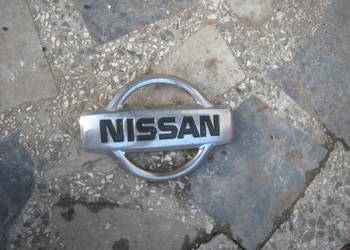 Znaczek emblemat maski przedniej przód Nissan Almera n16