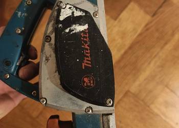 strug elektryczny marki Makita, model 1923B.