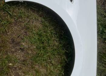 Błotnik Opel astra k