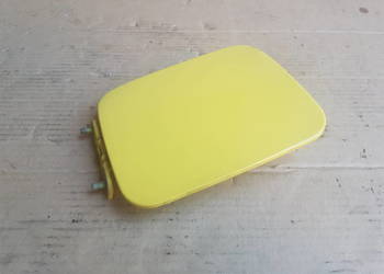 Suzuki Ignis FH 00-03 klapka wlewu paliwa żółty Z1E Suzuki Ignis FH 00-03 klapka wlewu paliwa żółty Z1E