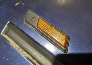Kierunkowskaz boczny błotnika BMW E34 E36 lewy oryginał