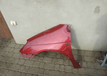 BŁOTNIK LEWY PRZEDNI RENAULT SCENIC 1 FL NV713
