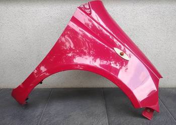 Toyota Yaris I 1 błotnik przedni prawy pasażera oryginał czerwony 3P0