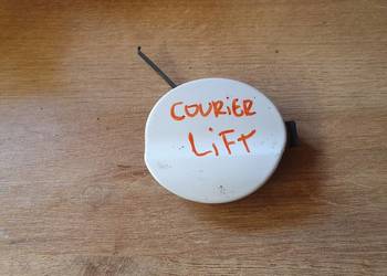 FORD COURIER LIFT ZAŚLEPKA HAKA PRZÓD JT76-17A989-AAW