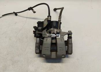 TESLA MODEL Y 2023r Zacisk hamulcowy tył lewy 1044625-00-B