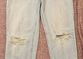 Jeansy jasny błękit damskie rozmiar 36 z dziurami na kolanach modne spodnie