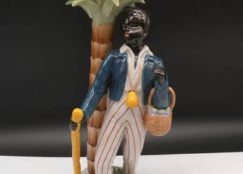 Zabytkowa Figurka Porcelanowa – Morian pod Palmą Pierwsza połowa XX wieku.