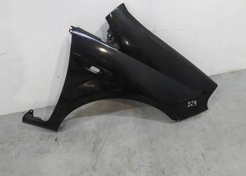 BŁOTNIK  PRAWY PRZÓD 876   Fiat Grande Punto