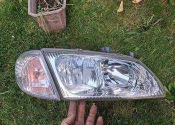 Lampa prawa przednia przód reflektor kierunkowskaz Nissan Almera N16 00-03