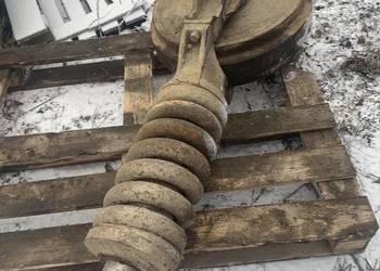 Koło napinające koparki NEW HOLLAND E215