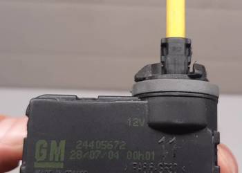 SILNICZEK REGULACJI LAMPY OPEL CORSA C D 24405672