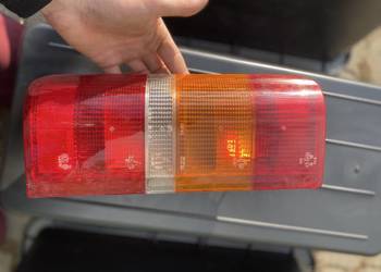 NOWA Oryginalna Lampa Tylna Prawa Ford Transit 1986-2000 95VG13404AC