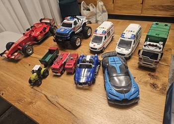 Zestaw samochodow ( Policja, Straż Pozarna, Karetka, bolid F1, traktor, wys