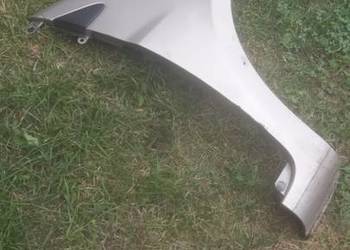 Blotnik przód prawy RENAULT CLIO 3 szary