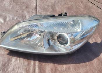Skoda Fabia II Lift   LAMPA LEWA PRZÓD REFLEKTOR LEWY SOCZEWKA / 369