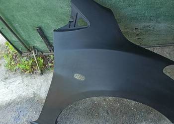Błotnik prawy Mazda 2de