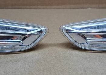 KIERUNKOWSKAZ BŁOTNIKA LEWY PRAWY OPEL ASTRA J 13273103 13273104