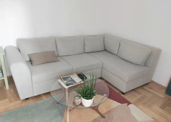 Jasnoszary narożnik szer. 250 cm z funkcją spania